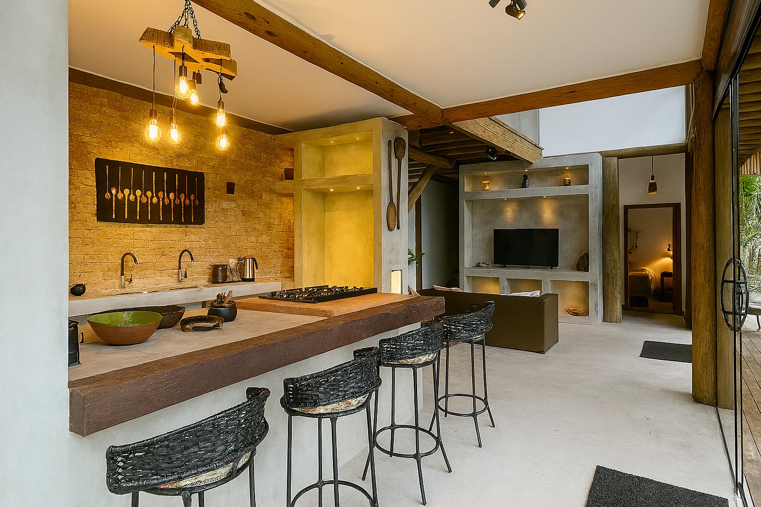 Cozinha ampla da Casa Bem Bahia integrada à sala e à varanda